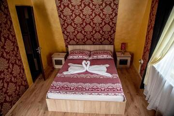 Фото номера Апартаменты с балконом Гостевой дом Casa Robi г. Peştişani 10