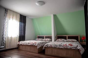 Фото номера Апартаменты с видом на горы Гостевой дом Casa Robi г. Peştişani 12